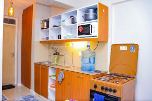 Kuchyň nebo kuchyňský kout v ubytování Enac Homes - Decorous, Classy & Elegant Executive Studios - Kiambu Road
