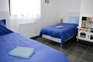 Posteľ alebo postele v izbe v ubytovaní La Mer Veille, maison neuve avec jardin