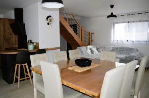 Posedenie v ubytovaní La Mer Veille, maison neuve avec jardin
