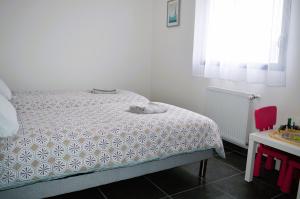 Posteľ alebo postele v izbe v ubytovaní La Mer Veille, maison neuve avec jardin