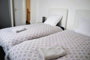 Posteľ alebo postele v izbe v ubytovaní La Mer Veille, maison neuve avec jardin