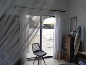 A balcony or terrace at House Near The Beach (Militsa & Aggeliki)
