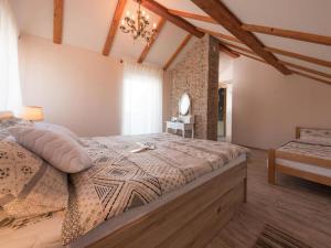 Postel nebo postele na pokoji v ubytování Apartman Bella Vista
