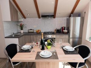 Kuchyň nebo kuchyňský kout v ubytování Apartman Bella Vista