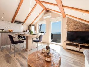 TV a/nebo společenská místnost v ubytování Apartman Bella Vista