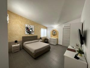 Voodi või voodid majutusasutuse LXR Rooms Carloforte toas