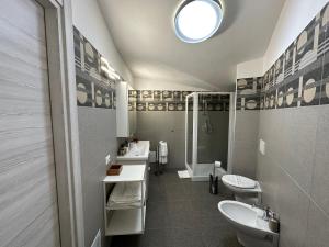 Vannituba majutusasutuses LXR Rooms Carloforte