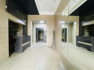 a lobby of a store with a glass door at VIP studio in the center of Kyiv residential complex "Yaroslavov Grad" in Kyiv