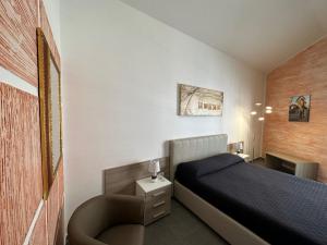 Voodi või voodid majutusasutuse LXR Rooms Carloforte toas