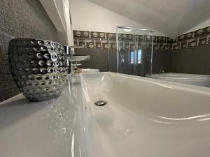 Vannituba majutusasutuses LXR Rooms Carloforte