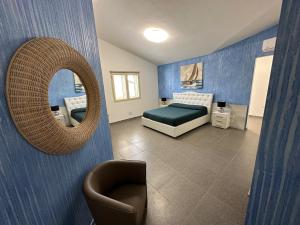 Voodi või voodid majutusasutuse LXR Rooms Carloforte toas