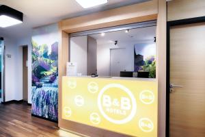Postel nebo postele na pokoji v ubytování B&B Hotel Kassel-Süd