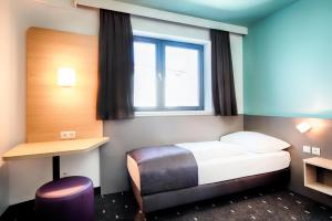 Gulta vai gultas numurā naktsmītnē B&B Hotel Graz-Hbf