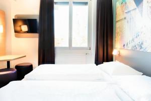 Gulta vai gultas numurā naktsmītnē B&B Hotel Graz-Hbf