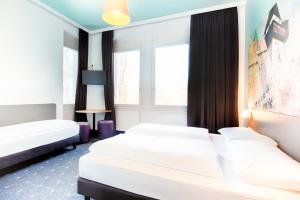 Gulta vai gultas numurā naktsmītnē B&B Hotel Graz-Hbf