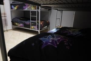 Letto o letti in una camera di Sonche Hostel
