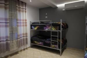 Letto o letti in una camera di Sonche Hostel