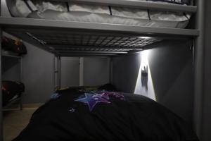 Letto o letti in una camera di Sonche Hostel