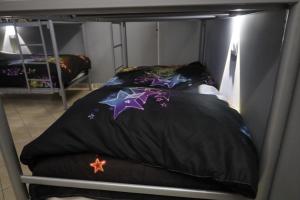Letto o letti in una camera di Sonche Hostel