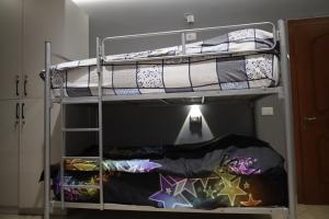 Letto o letti in una camera di Sonche Hostel