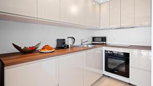 Kuchyň nebo kuchyňský kout v ubytování Cannes Marina Appart Hotel Mandelieu