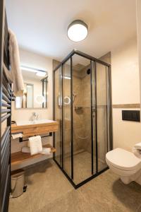 Kúpeľňa v ubytovaní Alpenhotel Kramerwirt