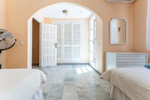 Postel nebo postele na pokoji v ubytování Townhouse beachside Fuengirola
