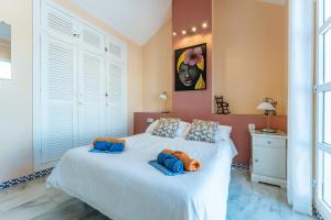 Postel nebo postele na pokoji v ubytování Townhouse beachside Fuengirola