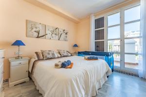 Postel nebo postele na pokoji v ubytování Townhouse beachside Fuengirola