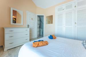 Postel nebo postele na pokoji v ubytování Townhouse beachside Fuengirola