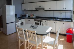 Kuchyňa alebo kuchynka v ubytovaní Apartamentos pilucha