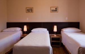 Ένα ή περισσότερα κρεβάτια σε δωμάτιο στο Pousada Do Ouvidor