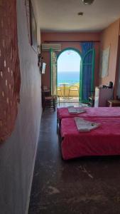 Posteľ alebo postele v izbe v ubytovaní Erofili Rooms