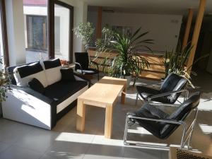 Posedenie v ubytovaní Rodinný wellness hotel U Langrů