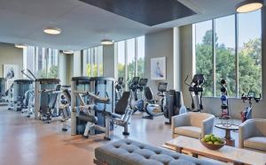 a gym with treadmills and elliptical machines at Downtown Studio w Gym Pool nr Metro Center LAX-279 in Los Angeles