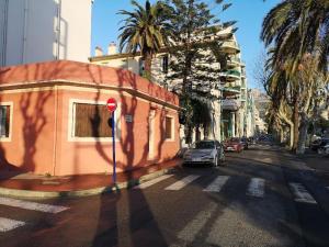 a small building on the side of a city street at COSY 2P A 5 MINUTES A PIED DE LA MER ET DU CENTRE in Menton