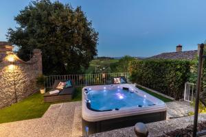 The swimming pool at or close to Villa Chianti, your Secret 4 Bedrooms Retreat with View over the Vineyards in Marcialla