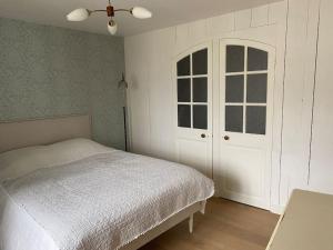 Posteľ alebo postele v izbe v ubytovaní Appartement Centre Bourg de Carnac 6 pers