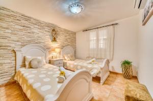 Postel nebo postele na pokoji v ubytování Ideal Property Mallorca - Can Caragol Inca