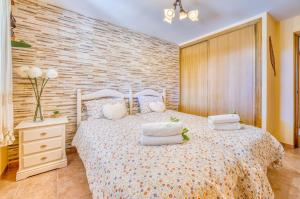 Postel nebo postele na pokoji v ubytování Ideal Property Mallorca - Can Caragol Inca