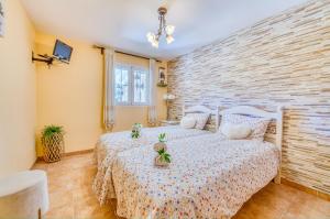 Postel nebo postele na pokoji v ubytování Ideal Property Mallorca - Can Caragol Inca
