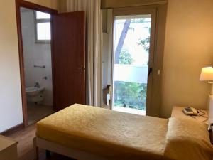Postel nebo postele na pokoji v ubytování Hotel B&B Risorta