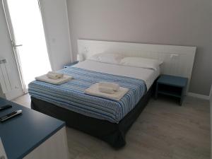 Letto o letti in una camera di Numana View