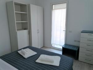 Letto o letti in una camera di Numana View