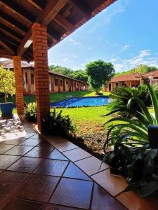 a view of a courtyard with a swimming pool at Pousada das Missoes in São Miguel das Missões