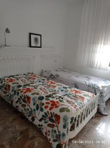 Katil atau katil-katil dalam bilik di Casa Mareque