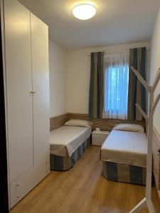 Postel nebo postele na pokoji v ubytování Villa Eribis