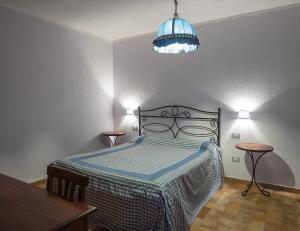 A bed or beds in a room at B&B Corte degli Struzzi