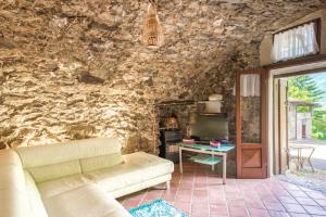 Posezení v ubytování Maison Enchantée
