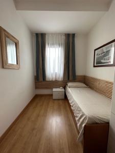 Postel nebo postele na pokoji v ubytování Villa Eribis